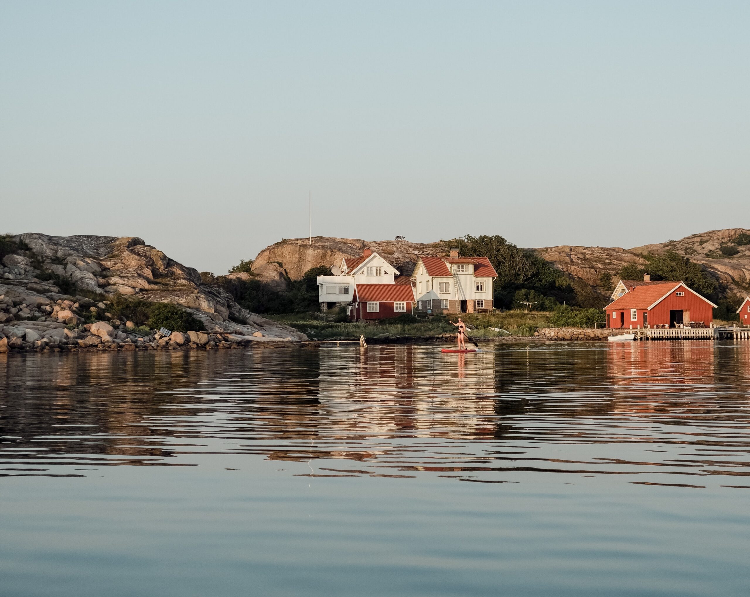 Living room with a corner sofa in front of a large TV